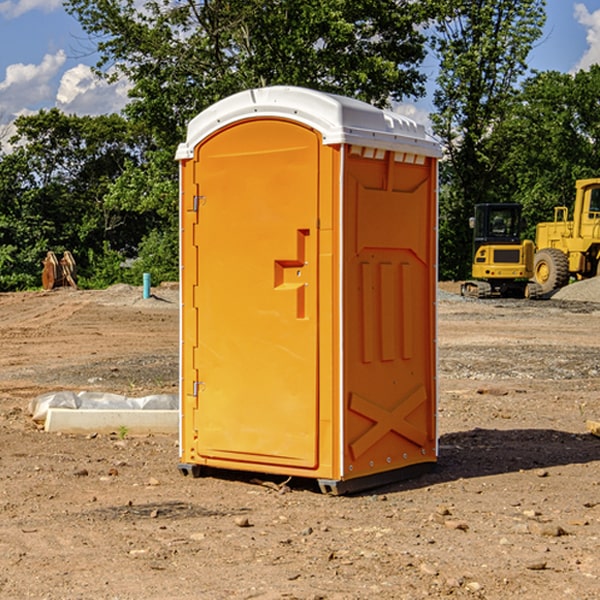 how often are the portable restrooms cleaned and serviced during a rental period in Dellroy